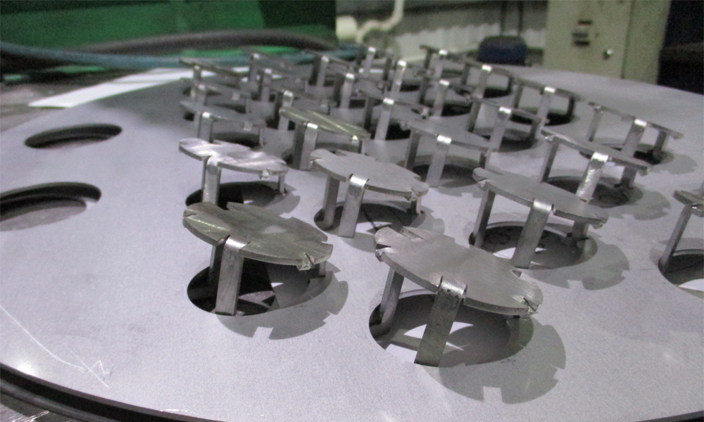 Клапанные тарелки