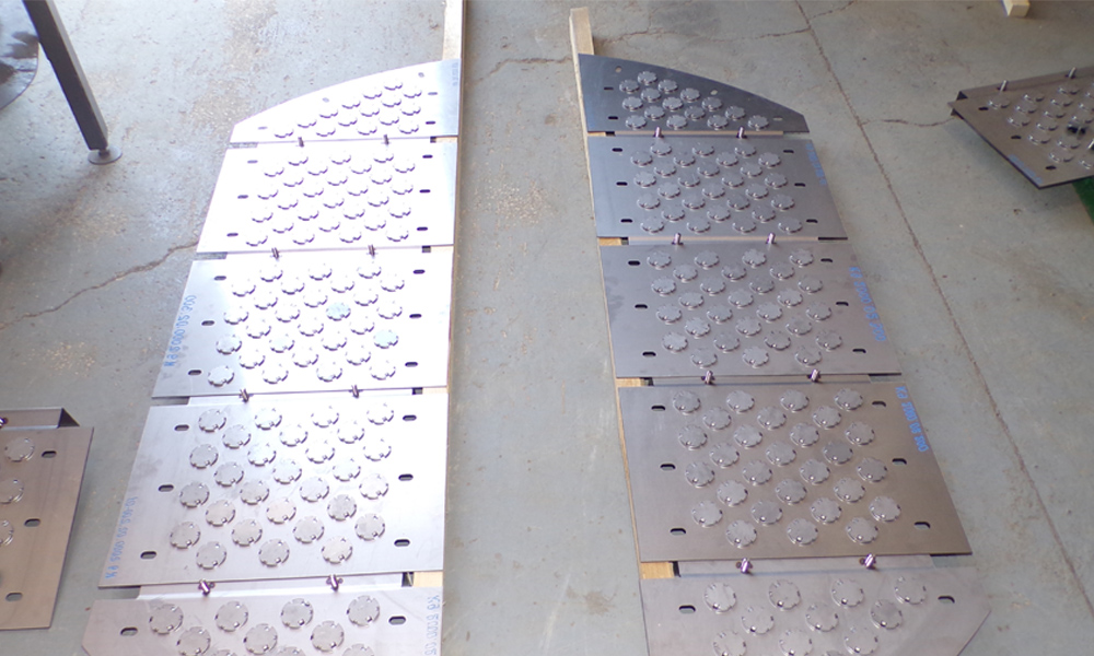 Клапанные тарелки